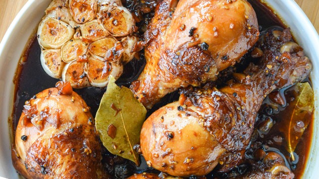 saucy filipino chicken adobo recipe with whole garlic