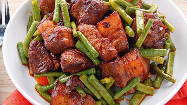 adobo de campesino in a white bowl