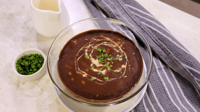 pork and beans champorado in a bowl