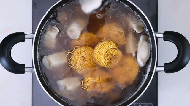 noodles and dumplings in soup