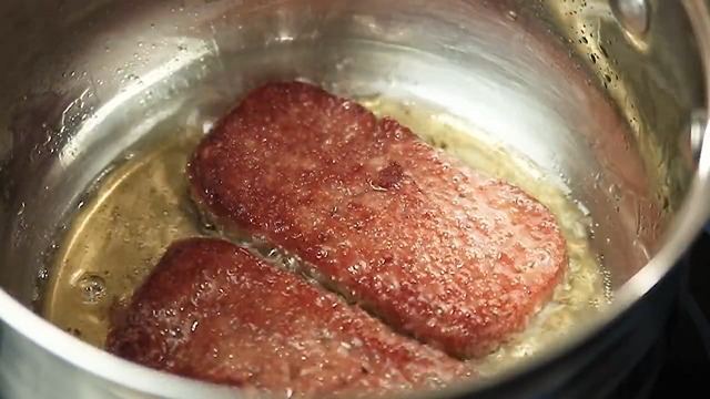 frying the spam in sesame oil